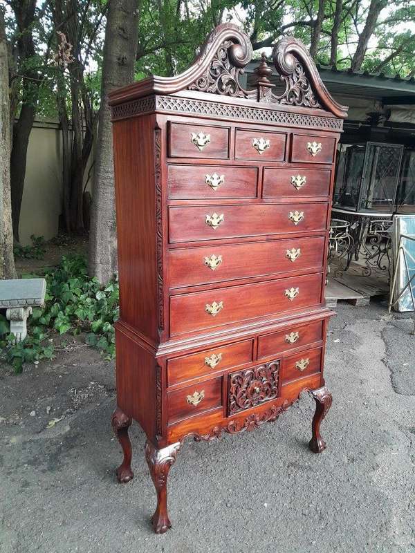 A 20th Century Queen Anne-Style Mahogany Highboy Chest On Chest In Two Parts With Brass Cut Escut...