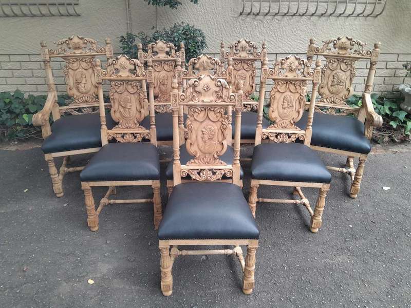 A 19th Century Circa 1880  Renaissance Revival Ornately Carved Oak Set of Dining Chairs Comprisi...