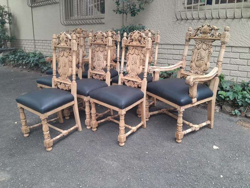 A 19th Century Circa 1880  Renaissance Revival Ornately Carved Oak Set of Dining Chairs Comprisi...