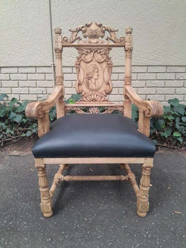 A 19th Century Circa 1880  Renaissance Revival Ornately Carved Oak Set of Dining Chairs Comprisi...