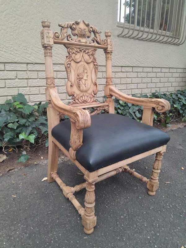 A 19th Century Circa 1880  Renaissance Revival Ornately Carved Oak Set of Dining Chairs Comprisi...