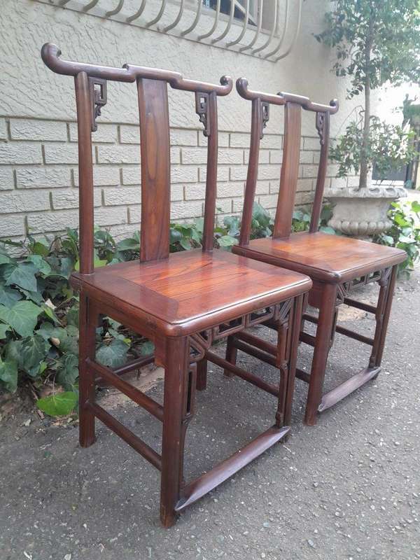 A 20th Century Pair Of Chinese Elm Yoke Back Wooden Chairs With Excellent Patina