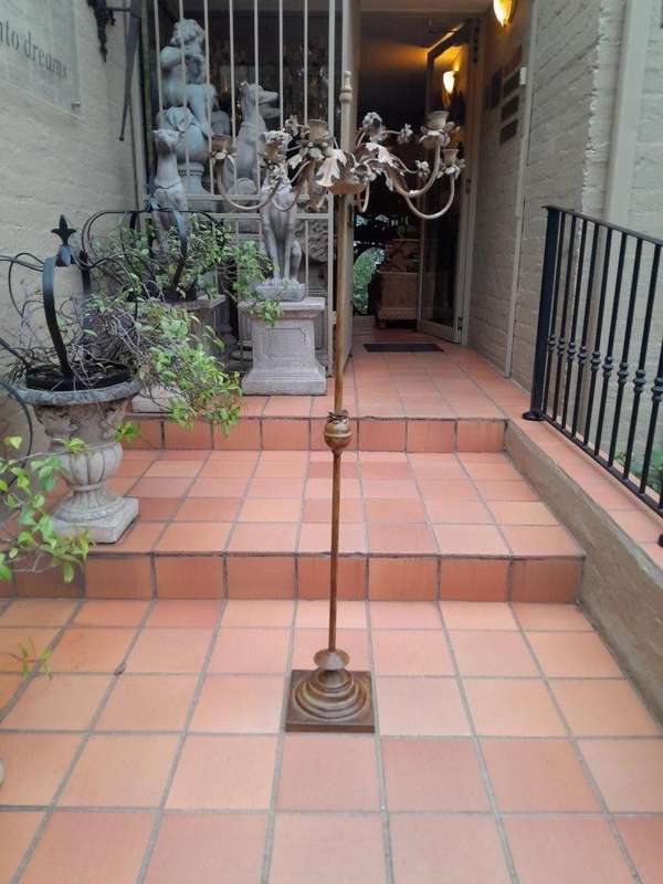 A 20TH Century Pair Of Wrought Iron Floor Candelabras