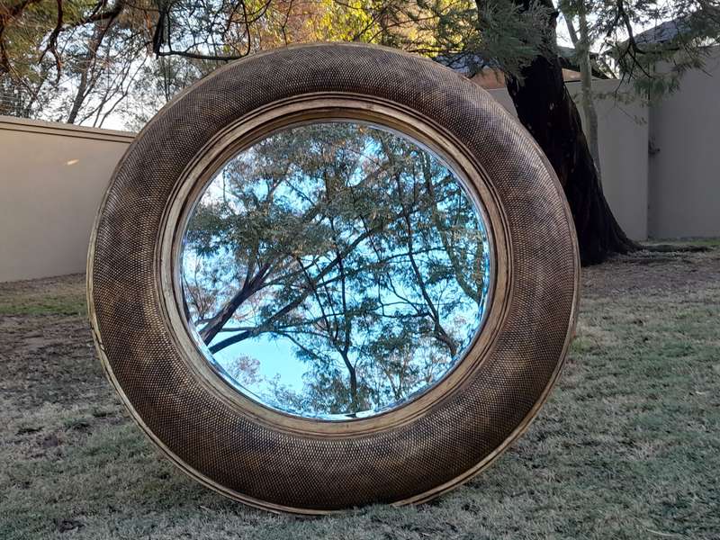 A Hang Gilded in Gold Leaf Bevelled Circular Mirror