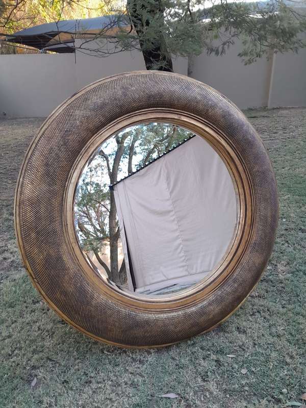 A Hang Gilded in Gold Leaf Bevelled Circular Mirror