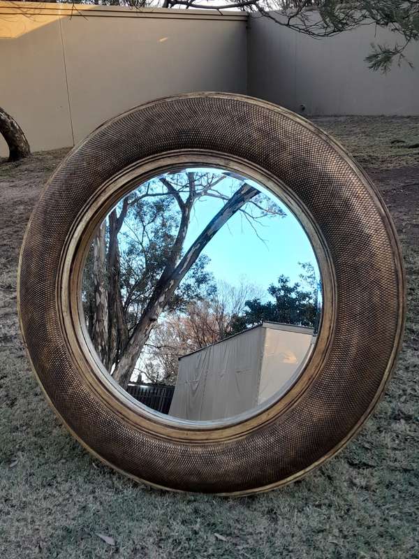 A Hang Gilded in Gold Leaf Bevelled Circular Mirror
