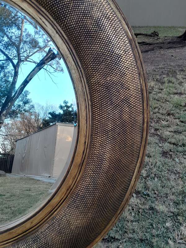 A Hang Gilded in Gold Leaf Bevelled Circular Mirror