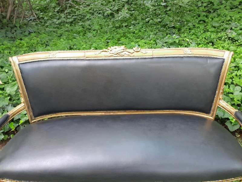 A 20th Century Set Of French Style Carved And Gilded Settee And Pair Of Armchairs Upholstered In ...