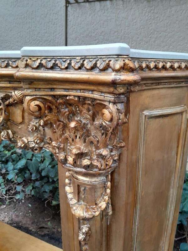 A 20TH Century French Style Ornately Hand Carved and Gilded Fireplace Surround
