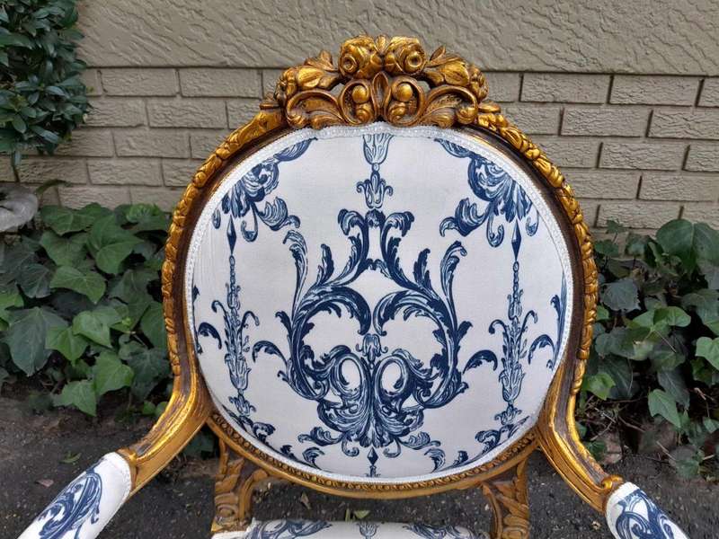 A 20TH Century French Louis XVI Style Set Of A Carved And Gilded Settee And Pair Of Armchairs