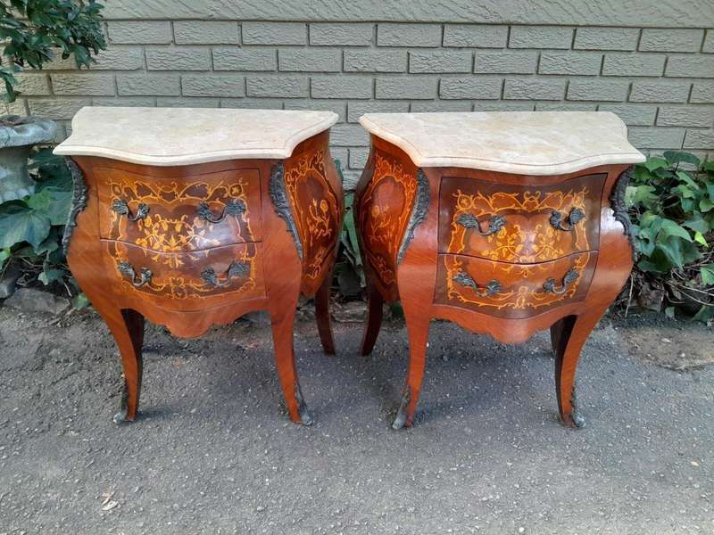 A 20th Century Pair of French Style Inlaid Mahogany Pedestals with Drawers and Marble Tops