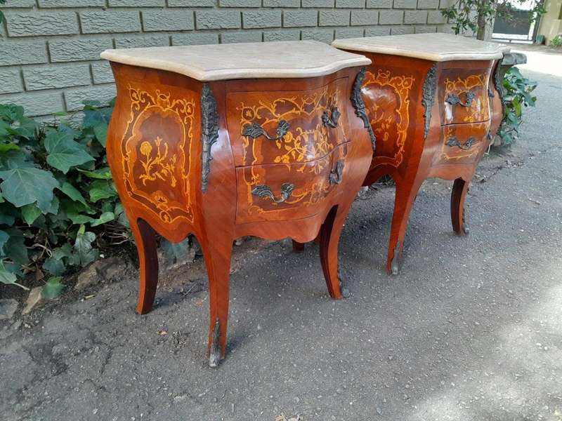 A 20th Century Pair of French Style Inlaid Mahogany Pedestals with Drawers and Marble Tops