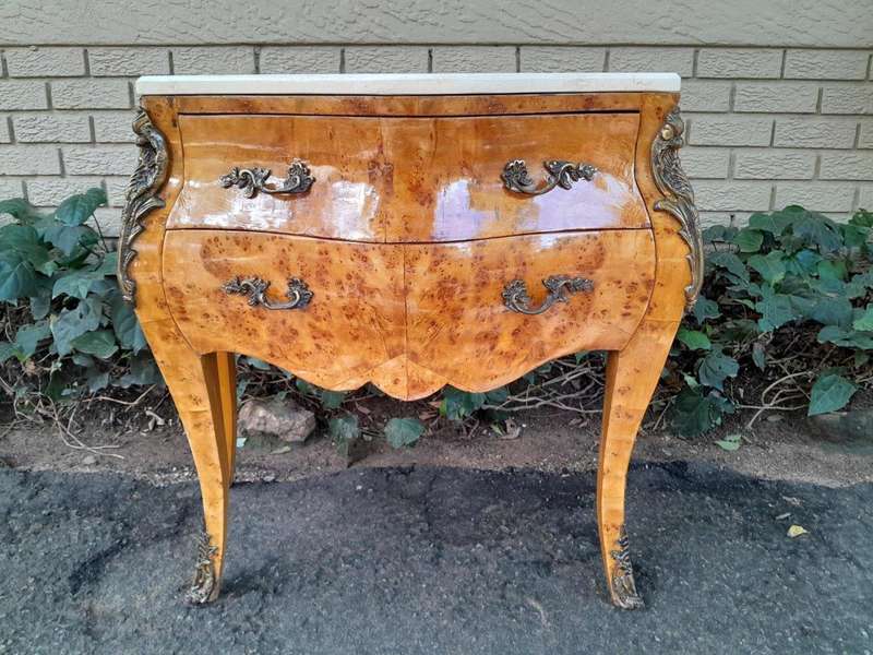 A 20th Century French Style Birds Eye Maple Bombe Chest of Drawers with Marble Top & Ormolu Mounts