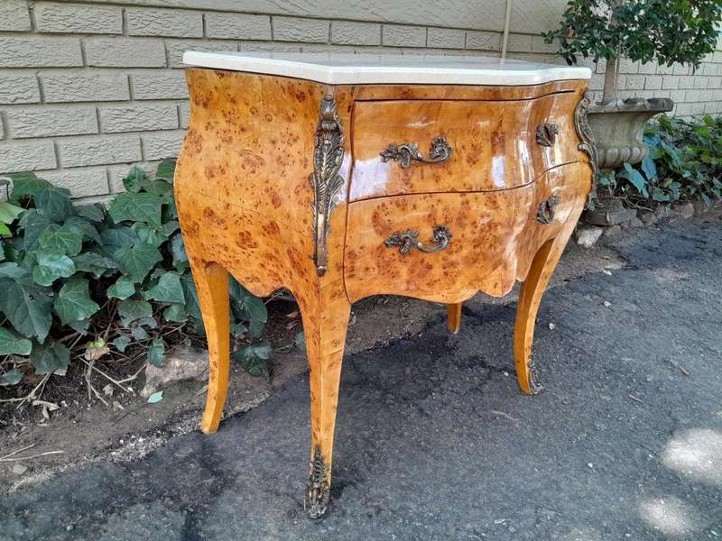 A 20th Century French Style Birds Eye Maple Bombe Chest of Drawers with Marble Top & Ormolu Mounts