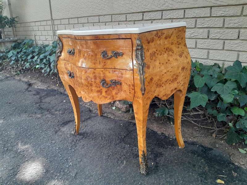 A 20th Century French Style Birds Eye Maple Bombe Chest of Drawers with Marble Top & Ormolu Mounts