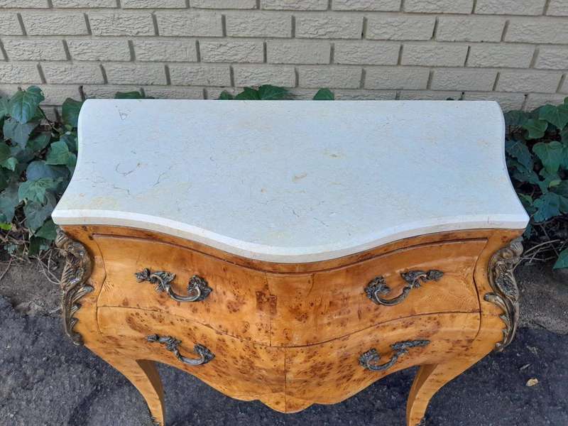 A 20th Century French Style Birds Eye Maple Bombe Chest of Drawers with Marble Top & Ormolu Mounts