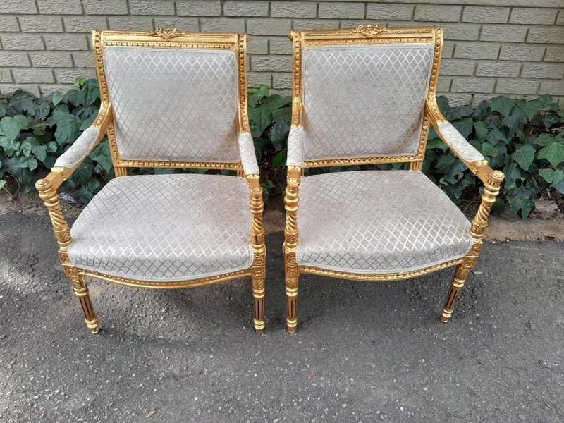 A Pair Of French Style Carved Wooden Gilded Armchairs