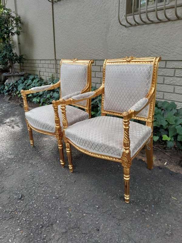 A Pair Of French Style Carved Wooden Gilded Armchairs