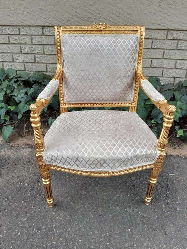 A Pair Of French Style Carved Wooden Gilded Armchairs