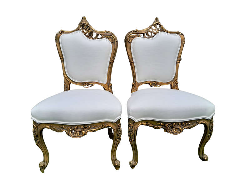 A Pair of French Rococo Style Carved Wooden Gilded Armchairs