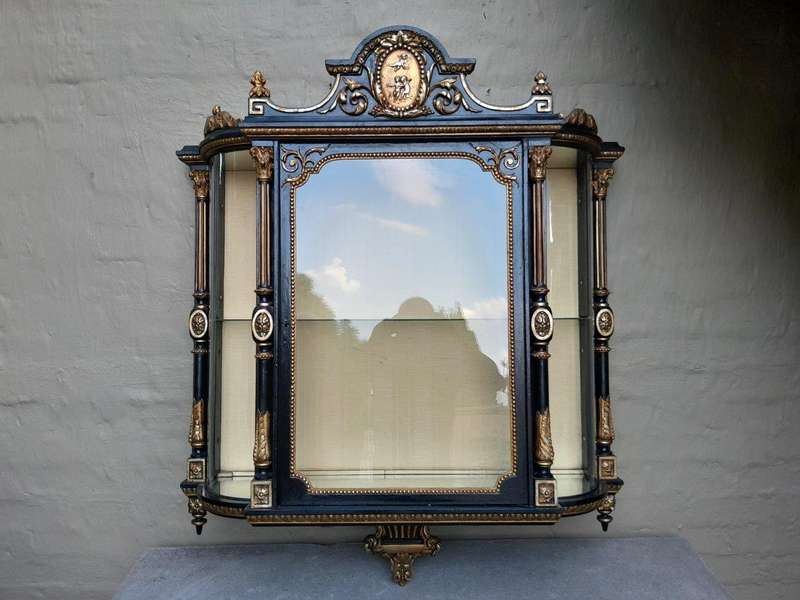 A Massive French 19th Century Carved and Gilded Wall Display Cabinet