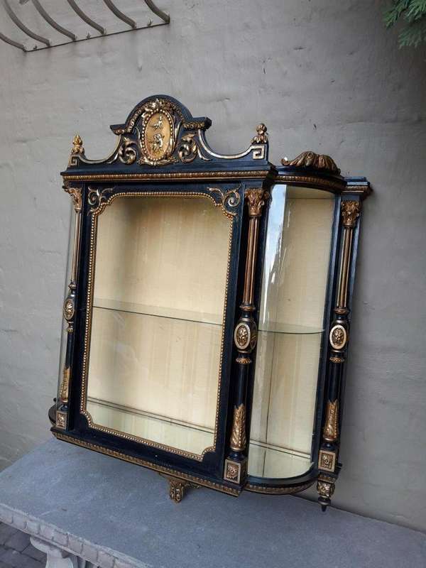 A Massive French 19th Century Carved and Gilded Wall Display Cabinet