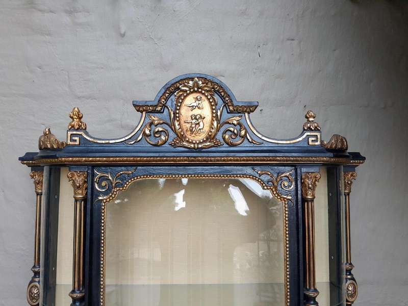 A Massive French 19th Century Carved and Gilded Wall Display Cabinet