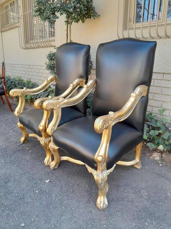 A Pair Of French Louis XIV Style Hand Gilded Armchairs Upholstered In Leather