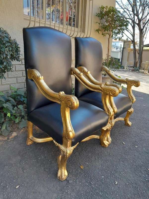 A Pair Of French Louis XIV Style Hand Gilded Armchairs Upholstered In Leather