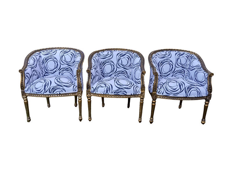 A 20th Century French Louis Bergere Style Set Of Three Carved and Gilded Chairs in a Custom Made ...