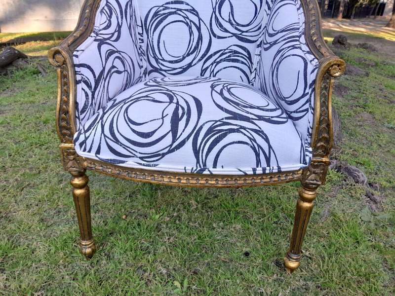 A 20th Century French Louis Bergere Style Set Of Three Carved and Gilded Chairs in a Custom Made ...