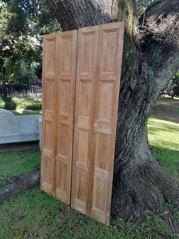 A 20th Century Pair of French Wooden Shutters with Bevelled Panels in a Contemporary Bleached Fin...