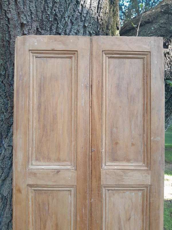 A 20th Century Pair of French Wooden Shutters with Bevelled Panels in a Contemporary Bleached Fin...