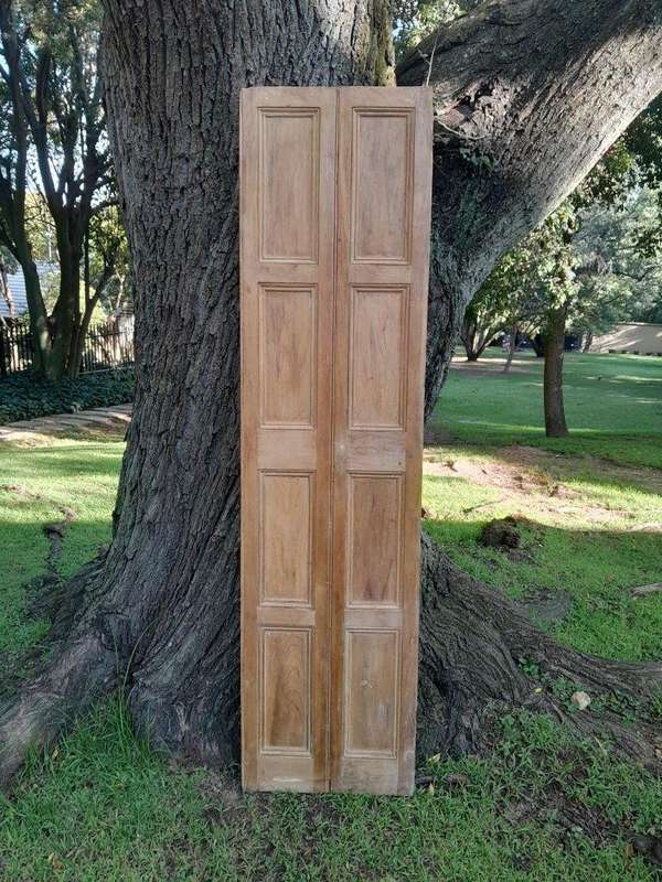 A 20th Century Pair of French Wooden Shutters with Bevelled Panels in a Contemporary Bleached Fin...
