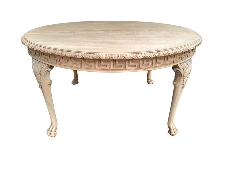 A 20th Century Heavily Carved Round Table in  a Contemporary Bleached Finish with Bevelled Mirro...