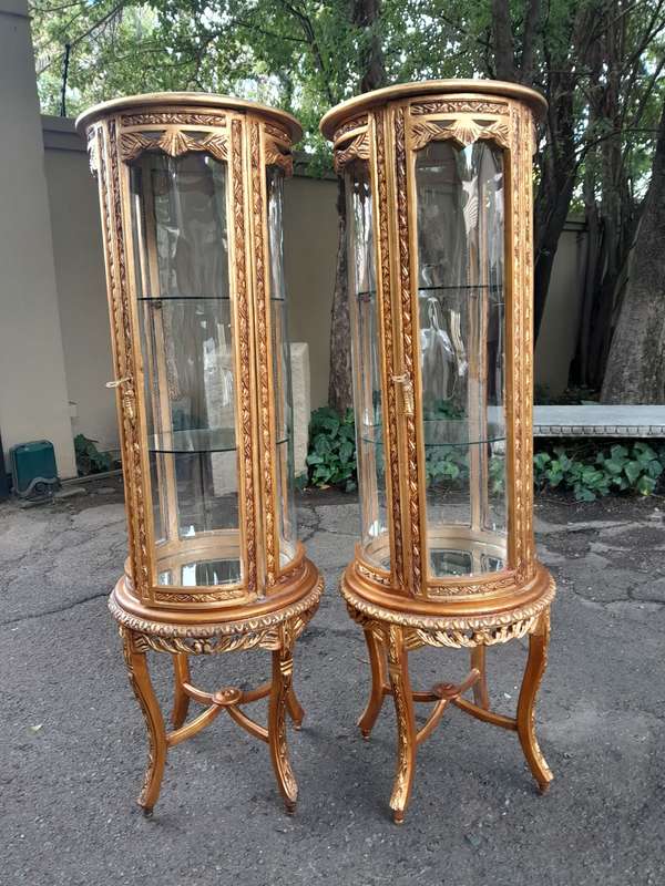 A French Style Pair of Gilded Cylindrical Display Cabinets / Vitrines with Marble Tops