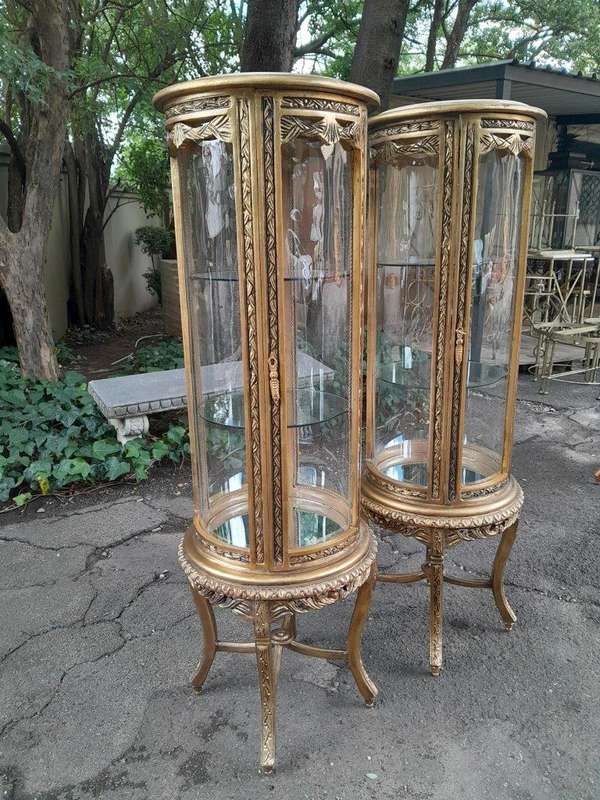 A French Style Pair of Gilded Cylindrical Display Cabinets / Vitrines with Marble Tops