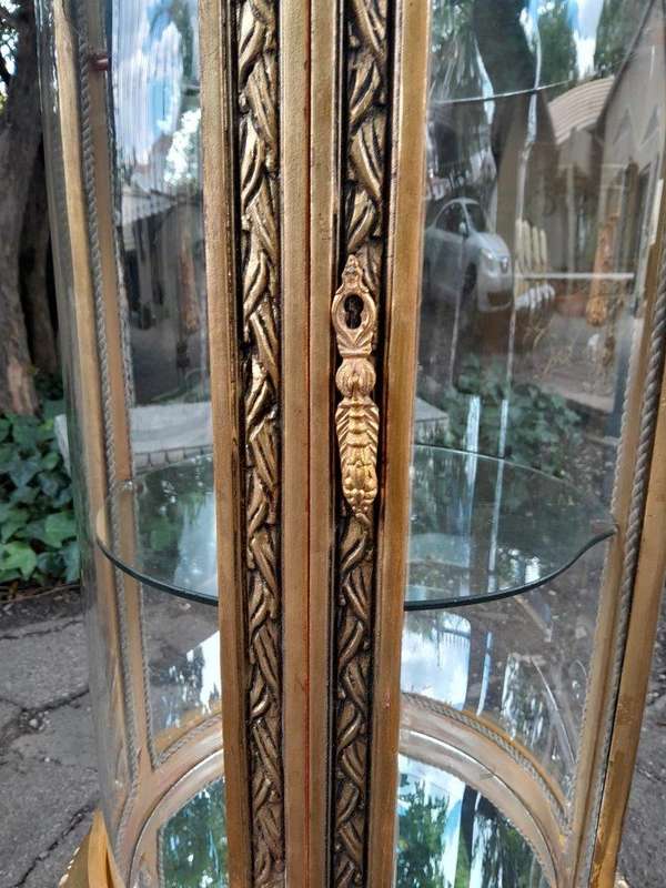 A French Style Pair of Gilded Cylindrical Display Cabinets / Vitrines with Marble Tops