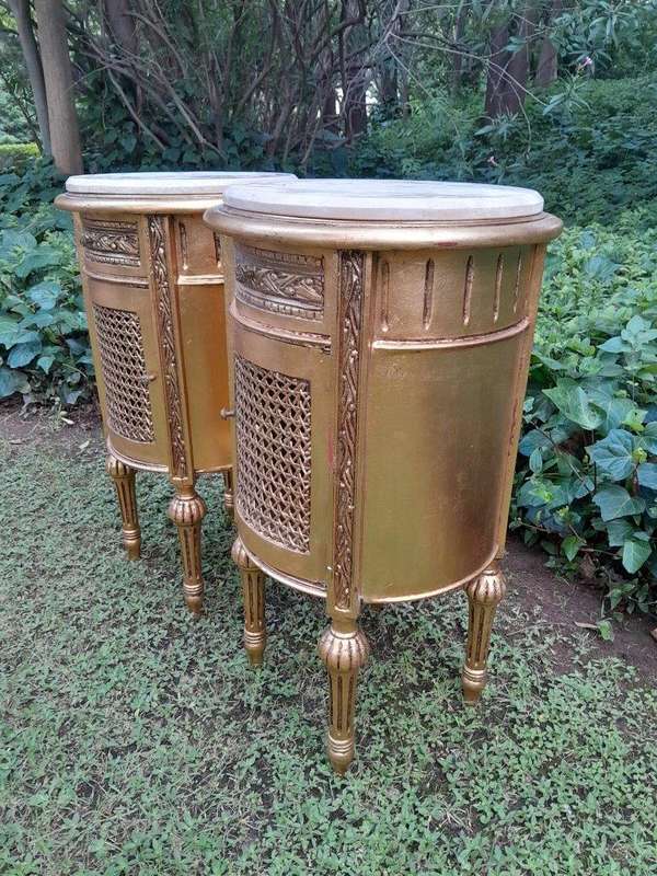A Pair of French Style Ornately Carved Giltwood Pedestals / Side Tables with Marble Tops