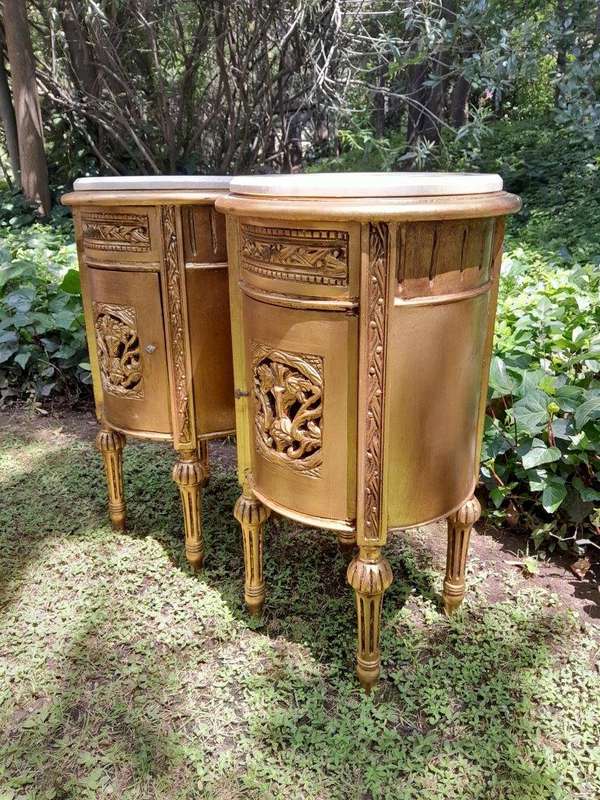 A Pair of French Style Ornately Carved Giltwood Pedestals / Side Tables with Marble Tops