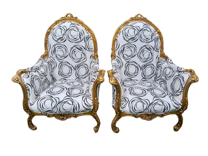 A 20th Century Pair of French Style Louis XVI Style Ornately Carved and Gilded Armchairs Upholste...
