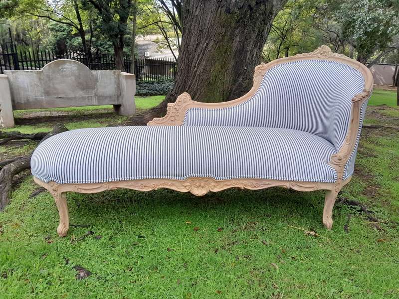 A 20th Century French Style Ornately Carved Chaise Longue in a Contemporary Bleached Finish and U...