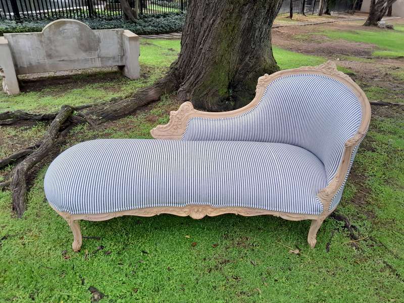 A 20th Century French Style Ornately Carved Chaise Longue in a Contemporary Bleached Finish and U...