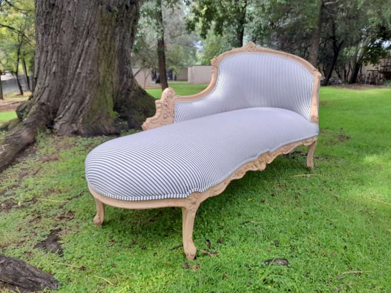 A 20th Century French Style Ornately Carved Chaise Longue in a Contemporary Bleached Finish and U...