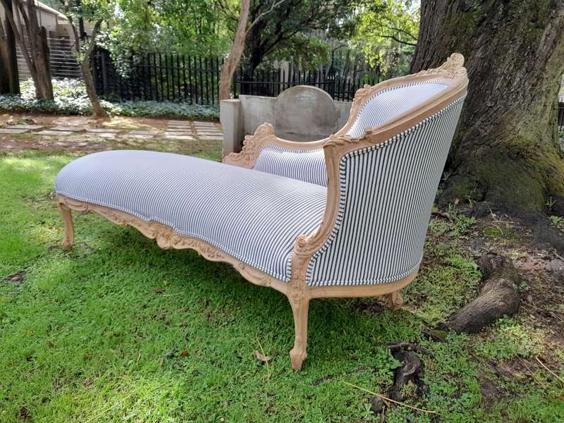 A 20th Century French Style Ornately Carved Chaise Longue in a Contemporary Bleached Finish and U...