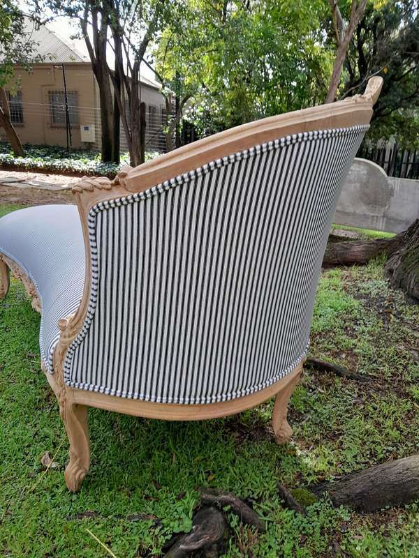 A 20th Century French Style Ornately Carved Chaise Longue in a Contemporary Bleached Finish and U...