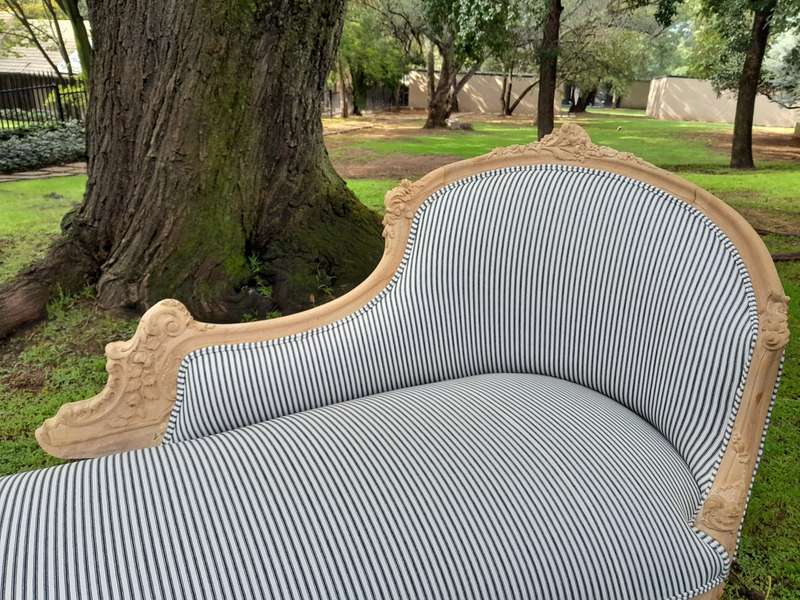A 20th Century French Style Ornately Carved Chaise Longue in a Contemporary Bleached Finish and U...