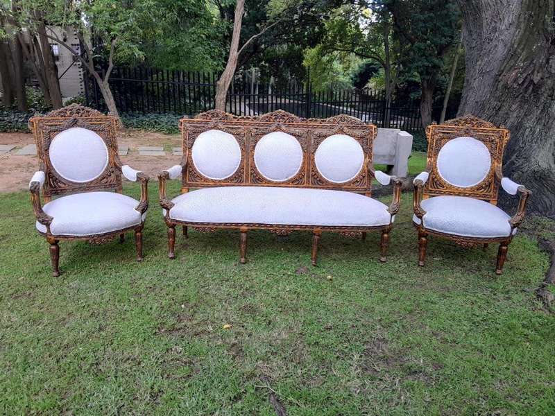 A 20th Century French Louis XVI Style Five Piece Set of Giltwood Settee and Four Armchairs