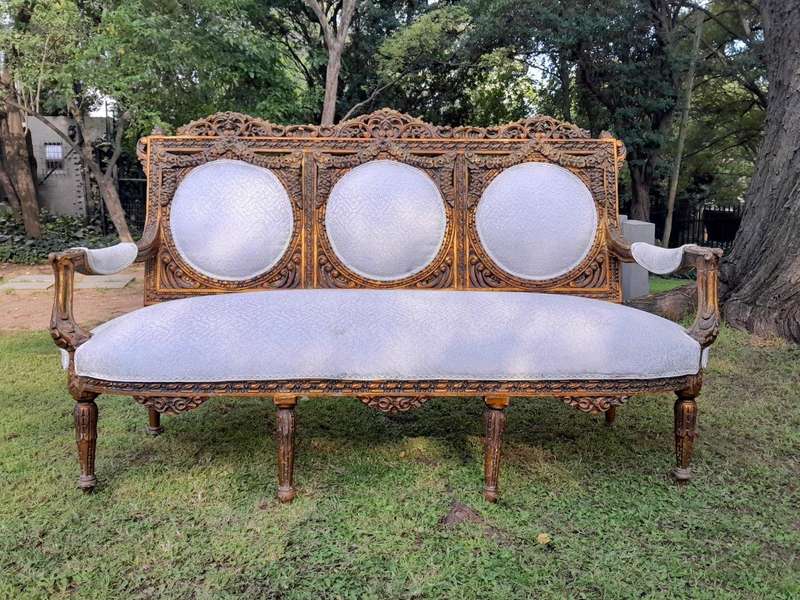 A 20th Century French Louis XVI Style Five Piece Set of Giltwood Settee and Four Armchairs