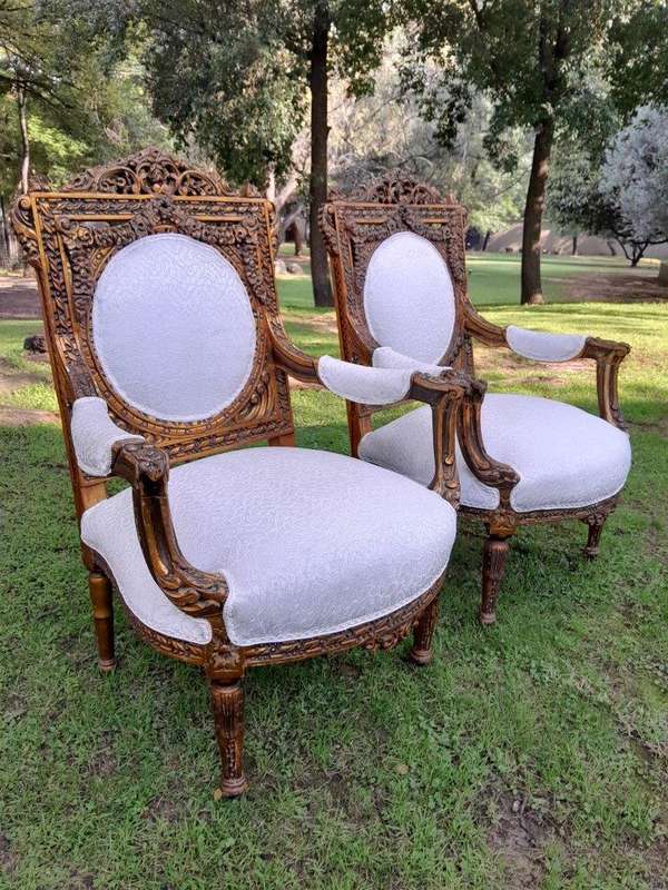 A 20th Century French Louis XVI Style Five Piece Set of Giltwood Settee and Four Armchairs